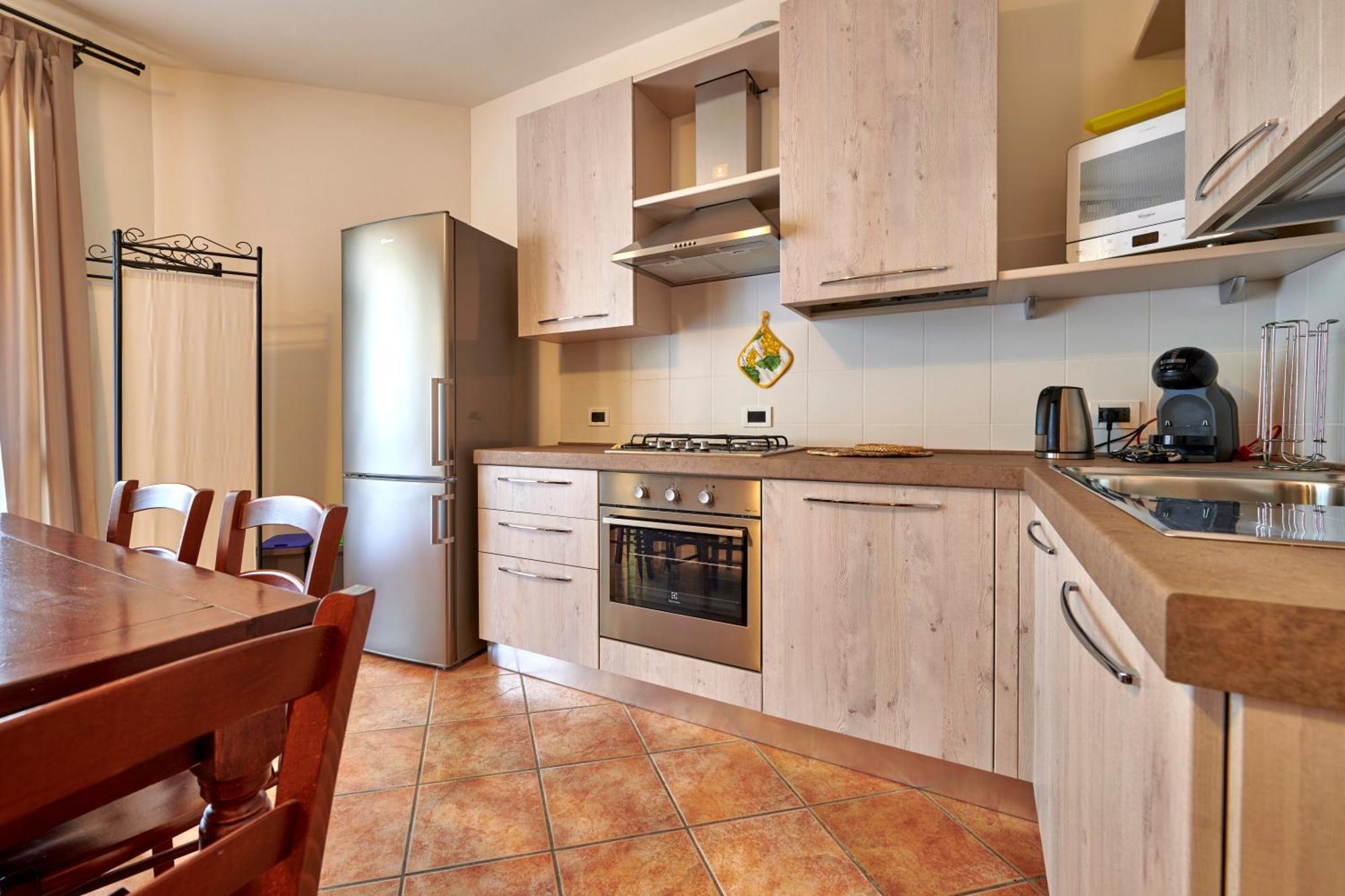 Apartmentsgarda - Baia D'Argento Residence กอสเตร์มาโน ภายนอก รูปภาพ